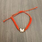 Βραχιόλι μακραμέ άσπρη πεταλούδα με πορτοκαλί κορδόνι