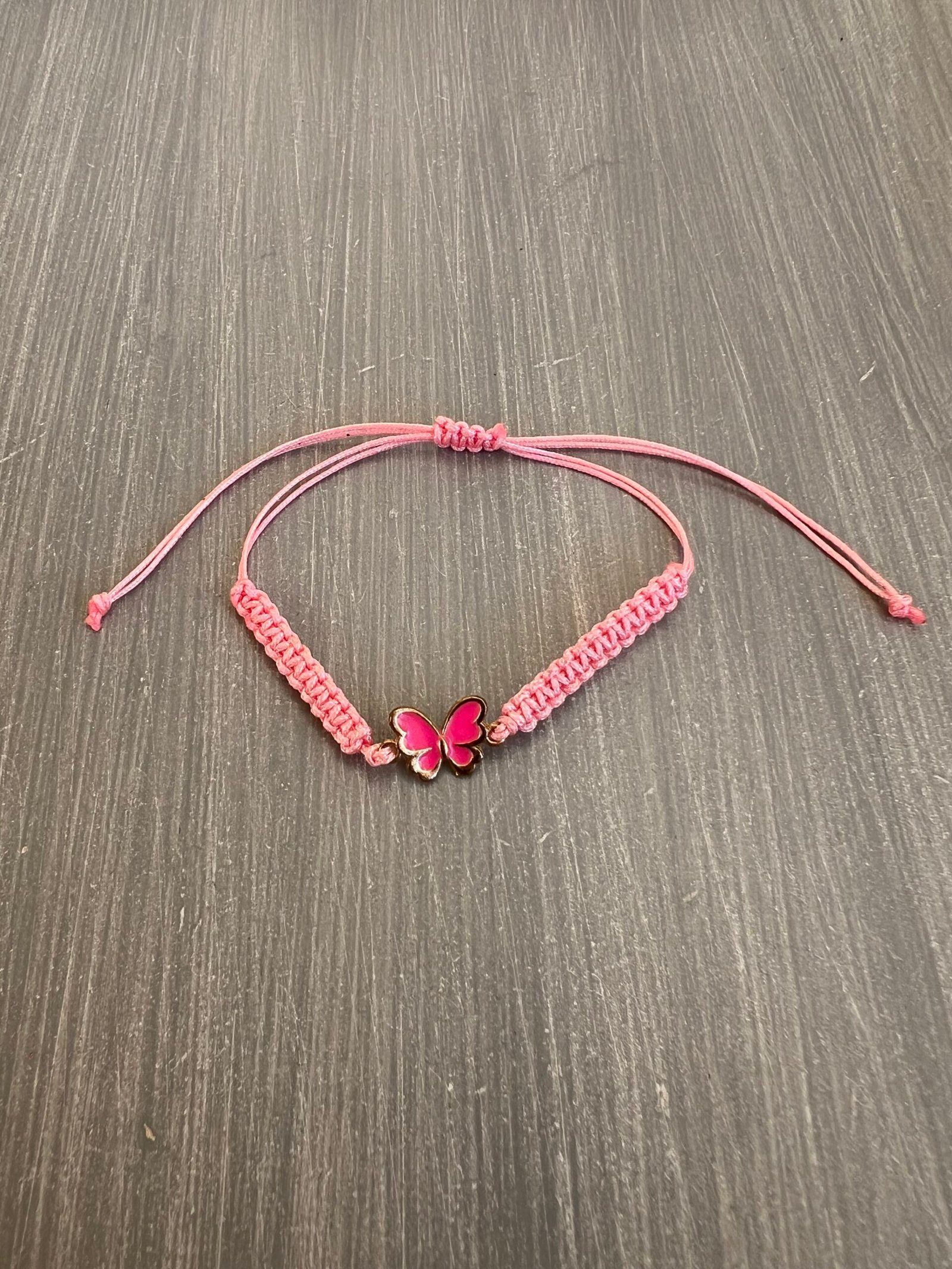 BRA90W-scaled-1.jpeg Βραχιόλι μακραμέ ροζ πεταλούδα με ροζ κορδόνι - Image 1