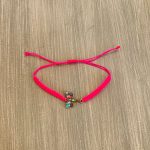 Βραχιόλι μακραμέ ασημί πεταλούδα με φούξια κορδόνι