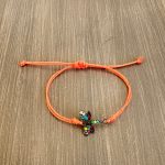 Βραχιόλι μακραμέ ασημί πεταλούδα με πορτοκαλί κορδόνι