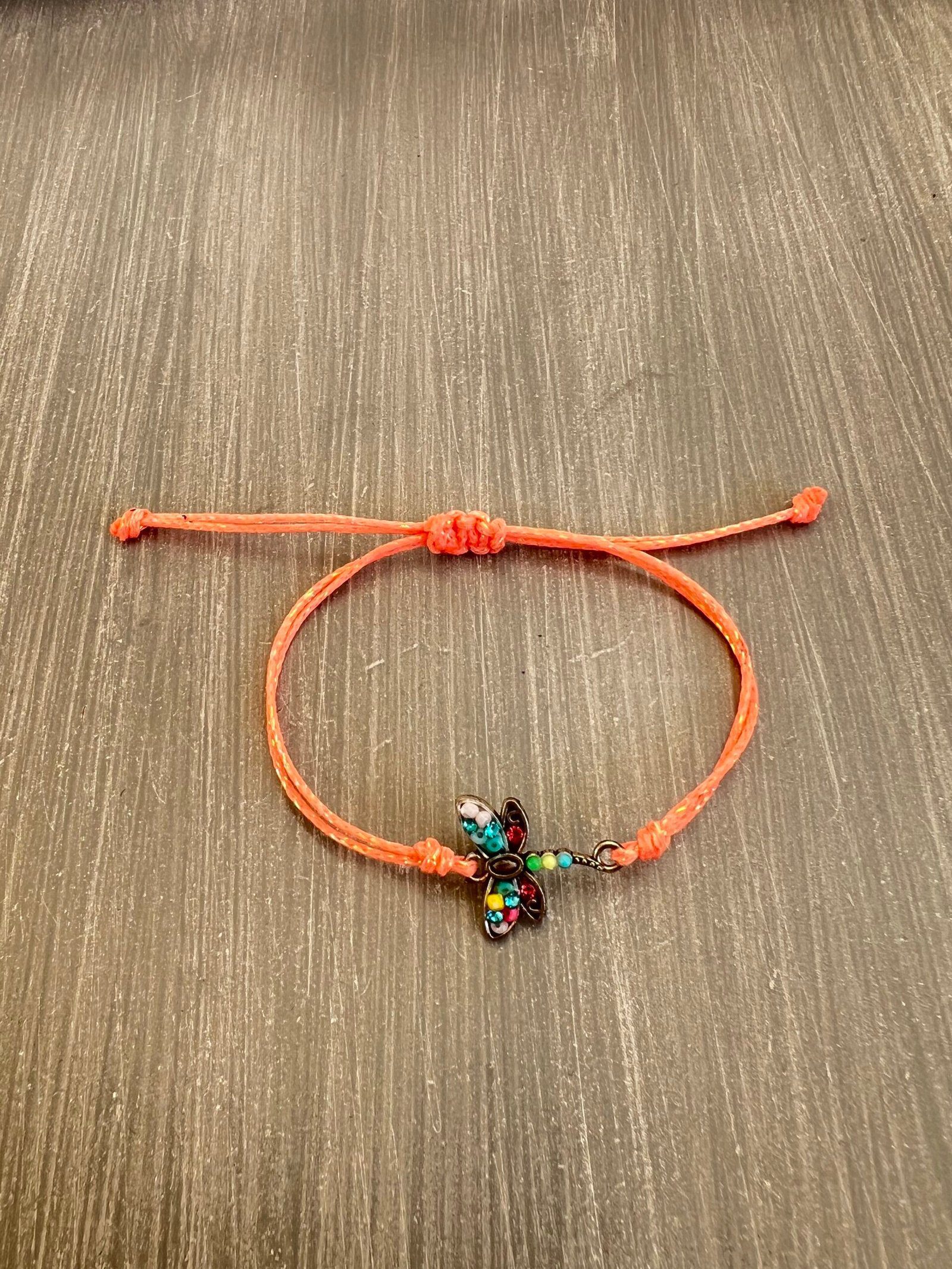 BRA95W-scaled-1.jpeg Βραχιόλι μακραμέ ασημί πεταλούδα με πορτοκαλί κορδόνι - Image 1