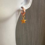 Ροζ κρίκοι με χρυσά αστέρια