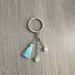 Μπρελόκ καρδιές με τυρκουάζ φούντα