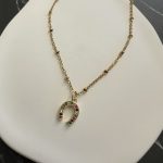 Κολιέ πέταλο με πολύχρωμα ζιργκόν και χρυσή αλυσίδα